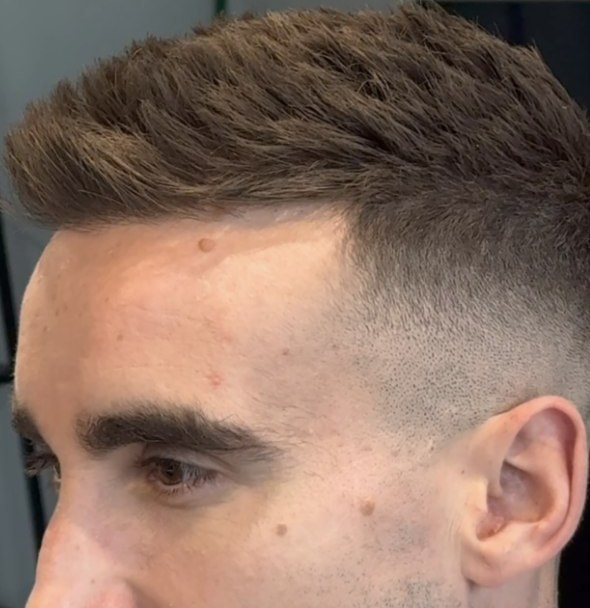 Textured look with a clean skin fade