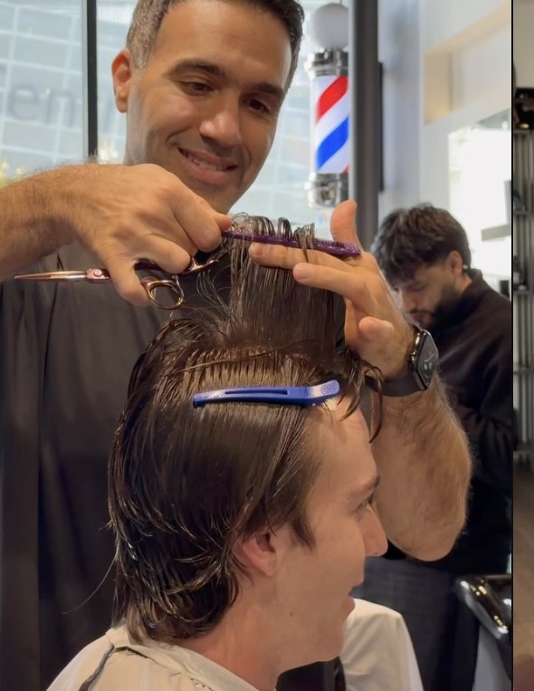 Scissor over comb at the chair