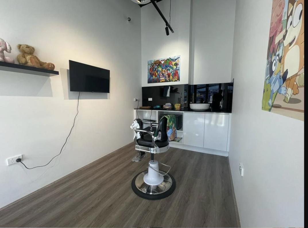 The dedicated kids' cutting room at AMIN with its own chair